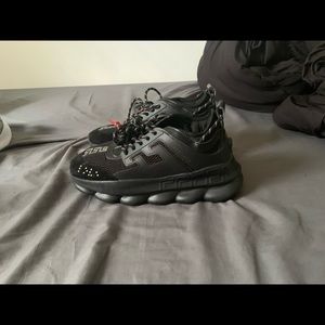 Versace chain reactions